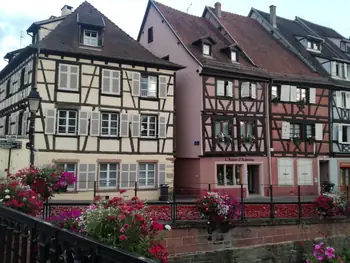 Folklore dancing in the evening at Colmar, Alsace (France)